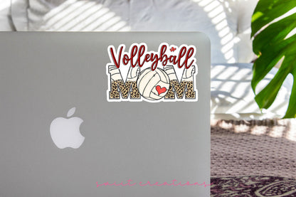 Volleyball Mom sticker on the lid of a silver laptop