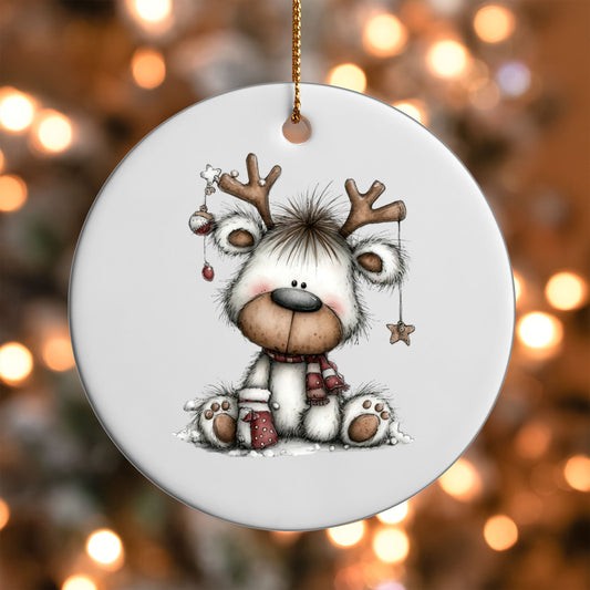 Whimsical Reindeer ornament UV DTF transfer on a round white ornament with a bokeh light background