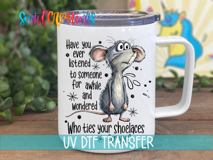 Who Ties Your Shoelaces UV DTF transfer on a white stainless steel mug with a lid