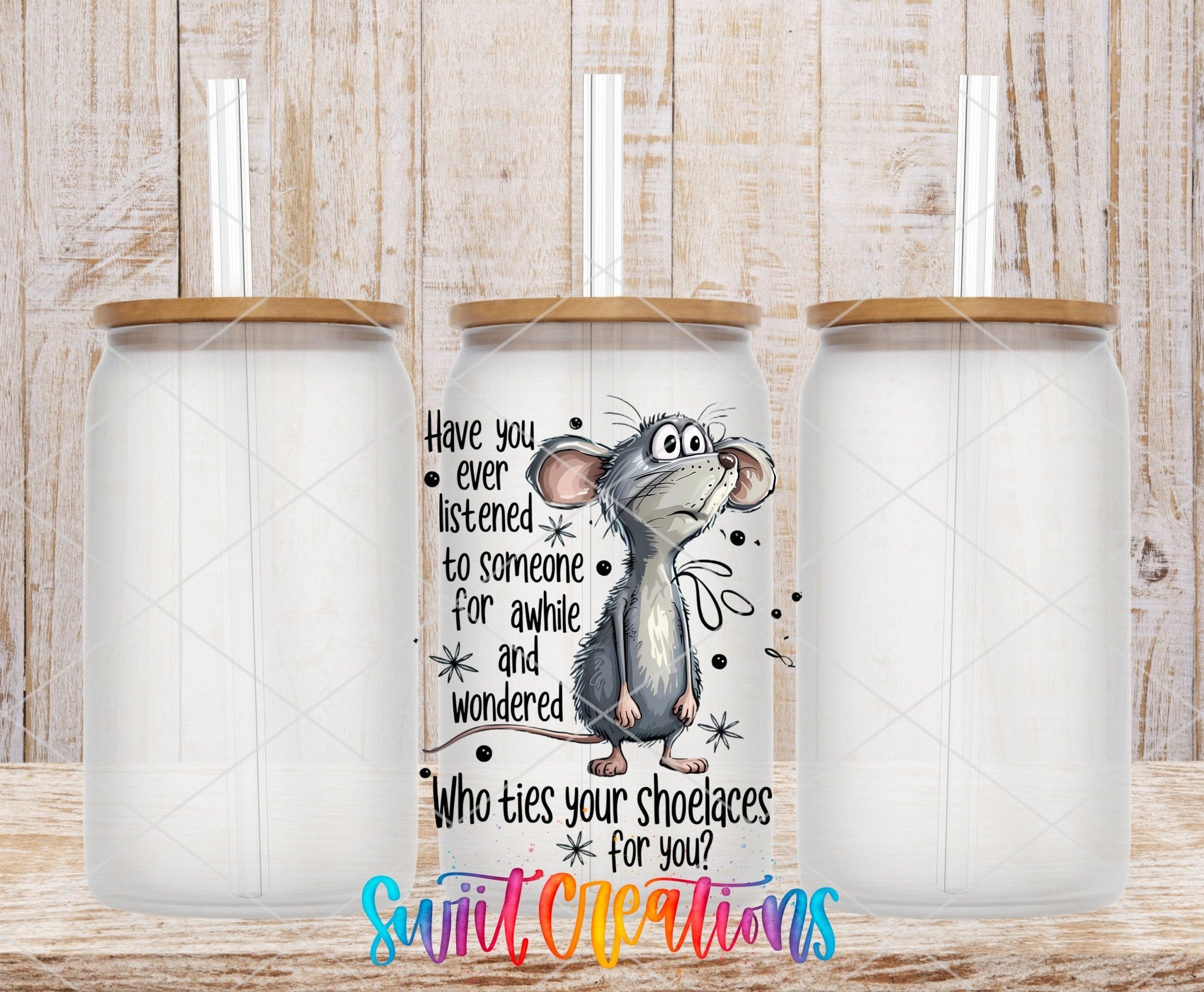 Who Ties Your Shoelaces UV DTF transfer applied to a clear glass can set from Swiit Creations