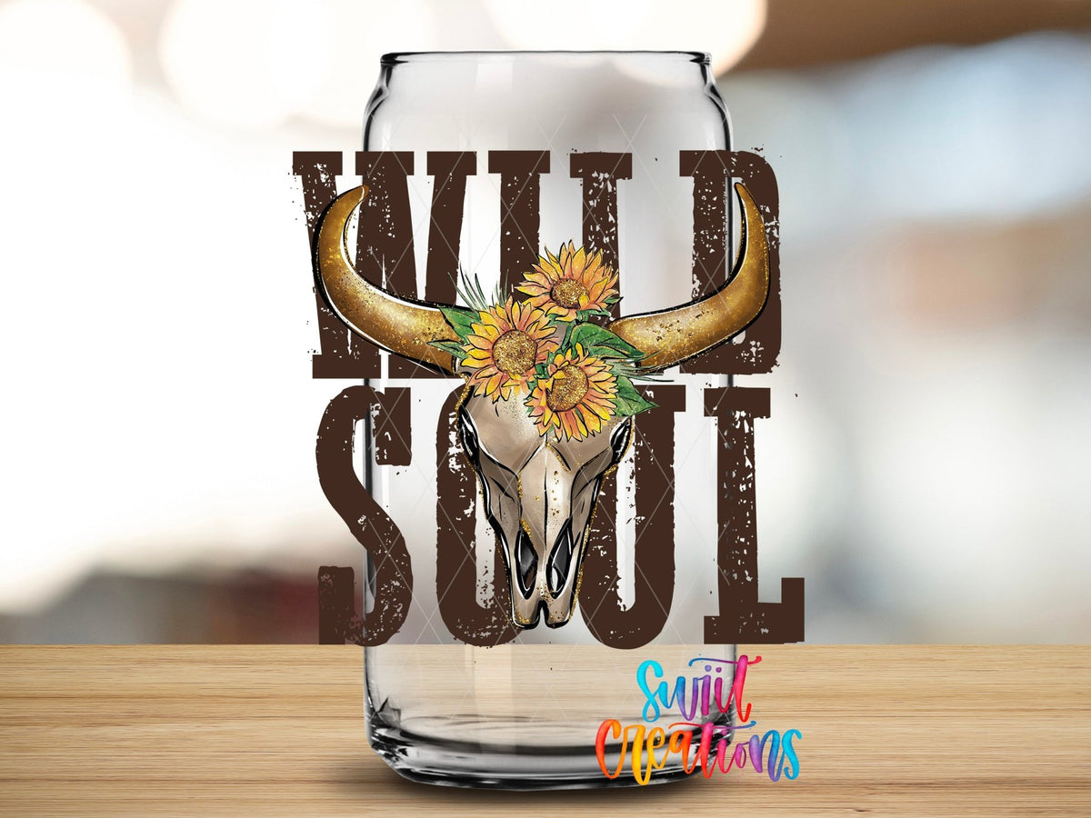 Close-up of the Wild Soul UV DTF transfer on a clear glass can