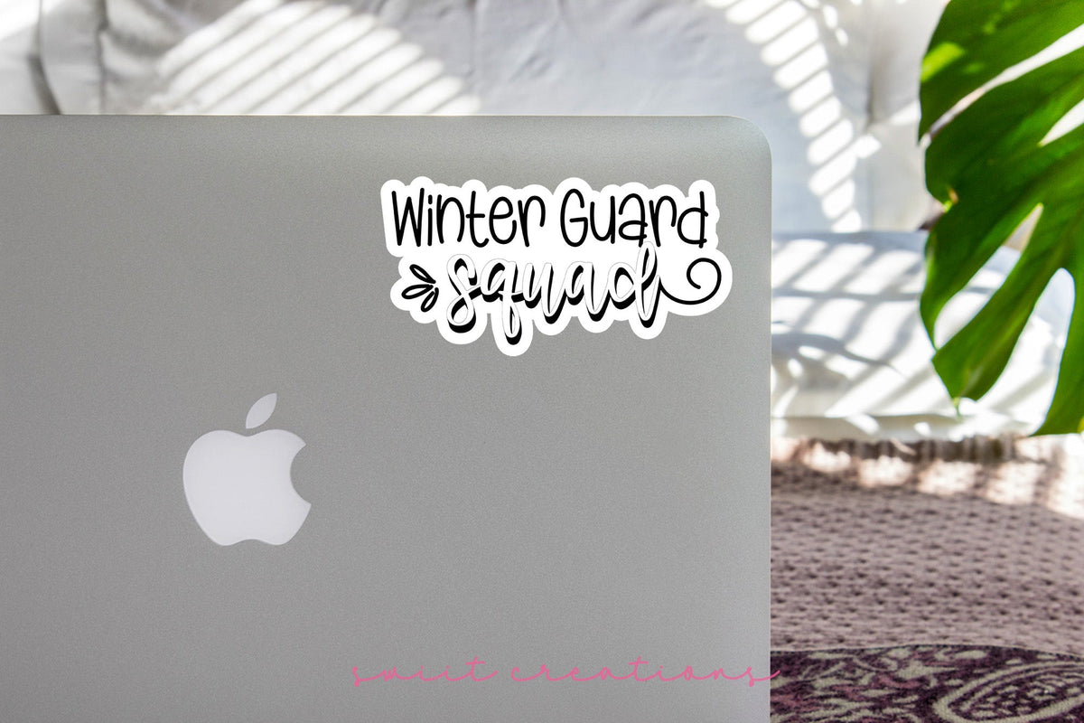 Winter Guard Squad sticker on the lid of a silver laptop
