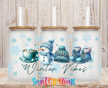 Winter Vibes UV DTF full wrap on three clear glass cans with bamboo lids