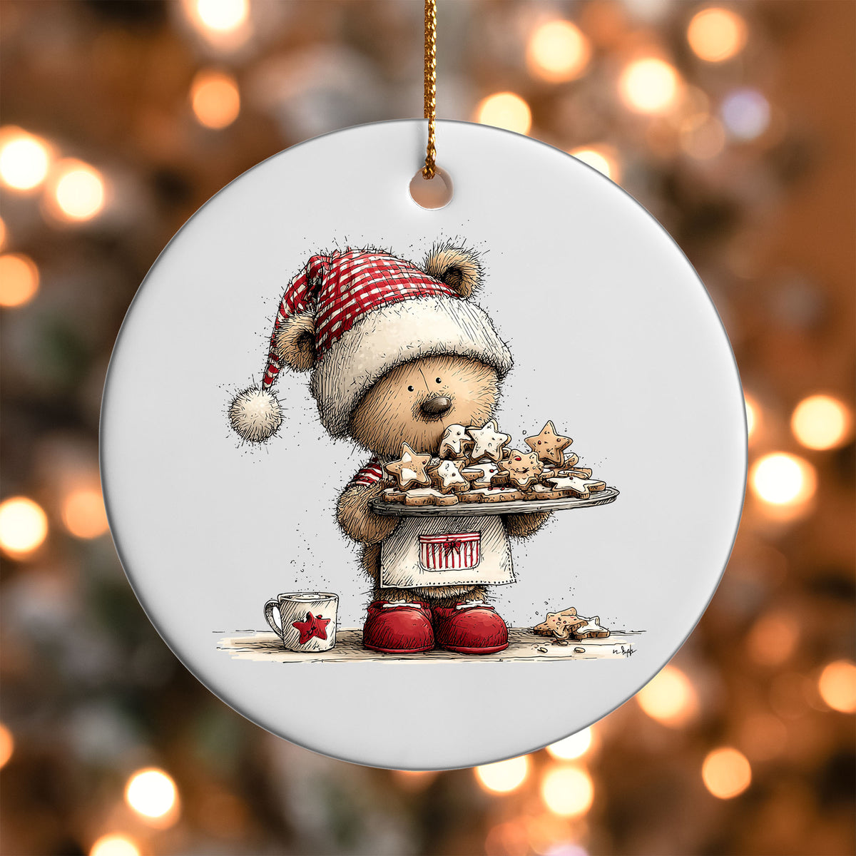 Woodland Bear with Cookies ornament UV DTF transfer on a round white ornament with a bokeh light background