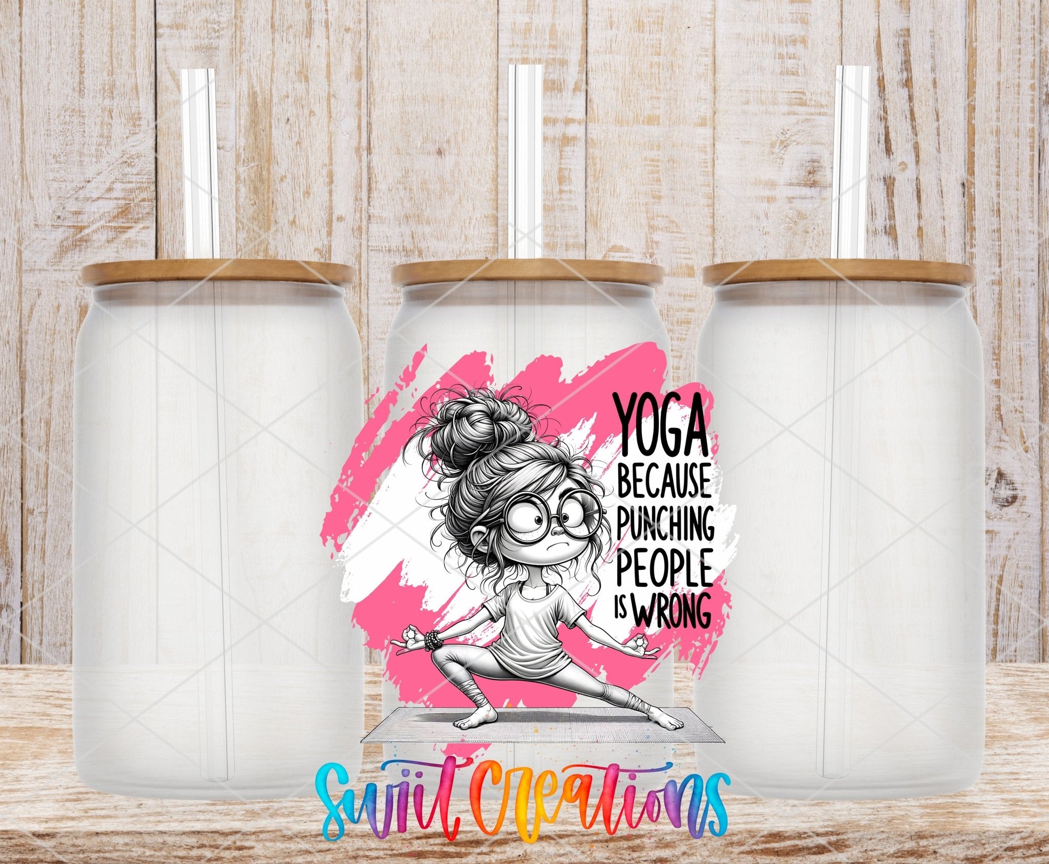 Swiit Creations UV DTF Yoga Instead of Punching People transfer shown on a clear glass can set