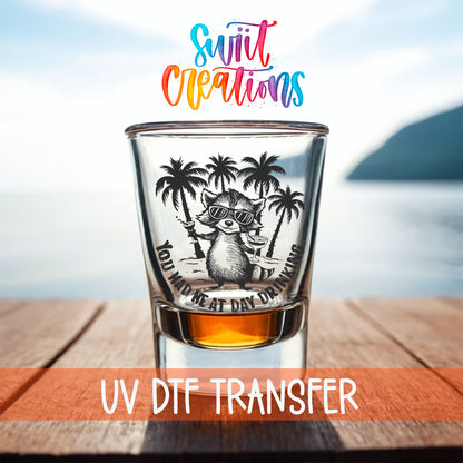 You Had Me at Day Drinking shot glass UV DTF transfer on a filled shot glass on a dock by the water