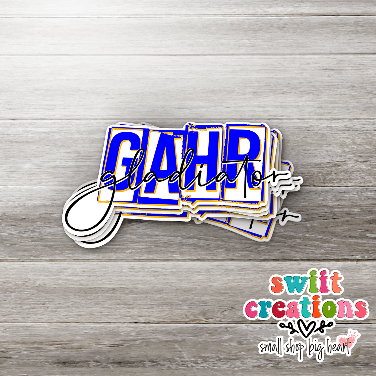 Stack of Gahr Gladiators Blue Script glossy stickers on gray wood with the Swiit Creations logo